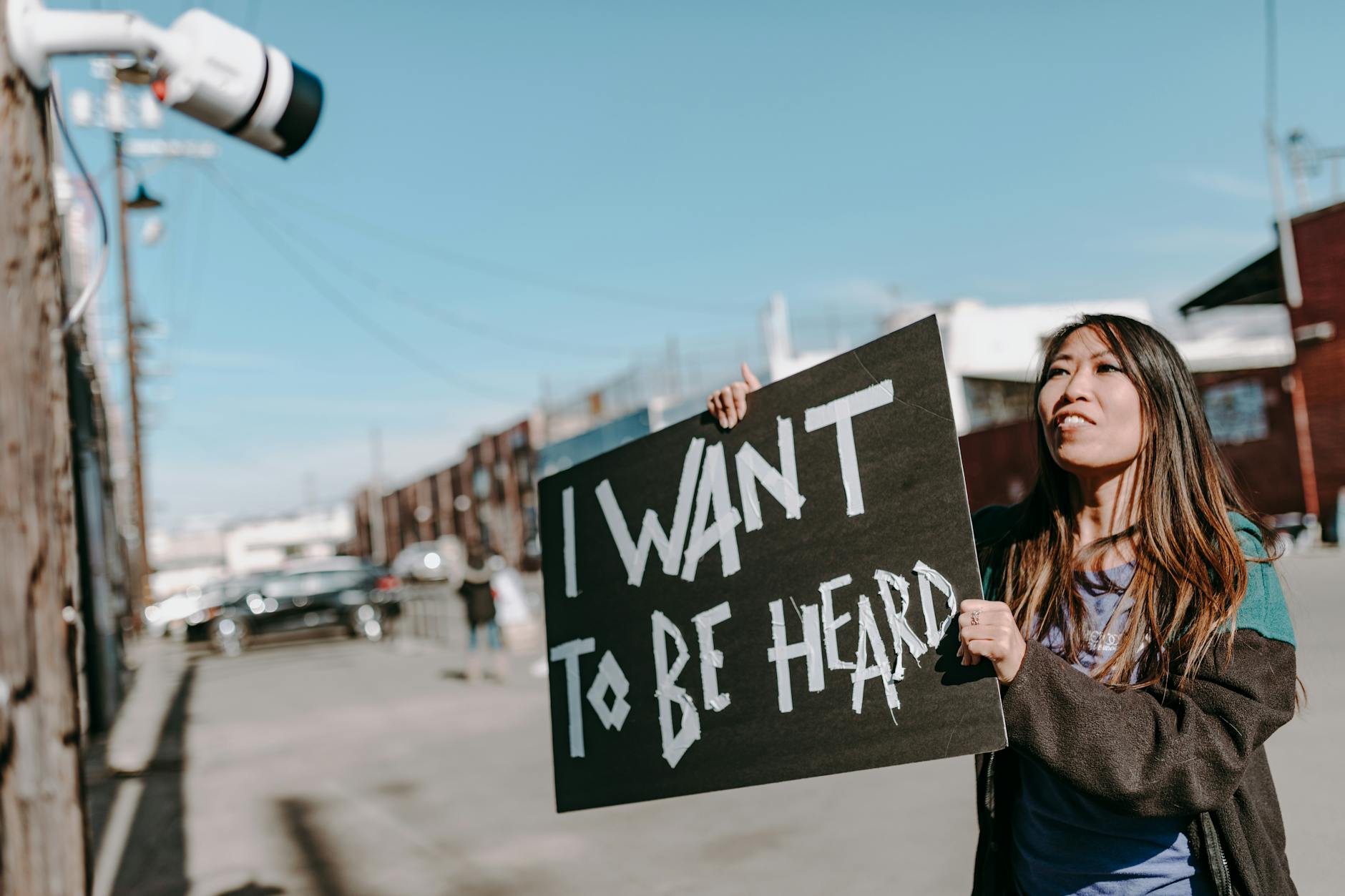 protestor with sign, I want to be heard
